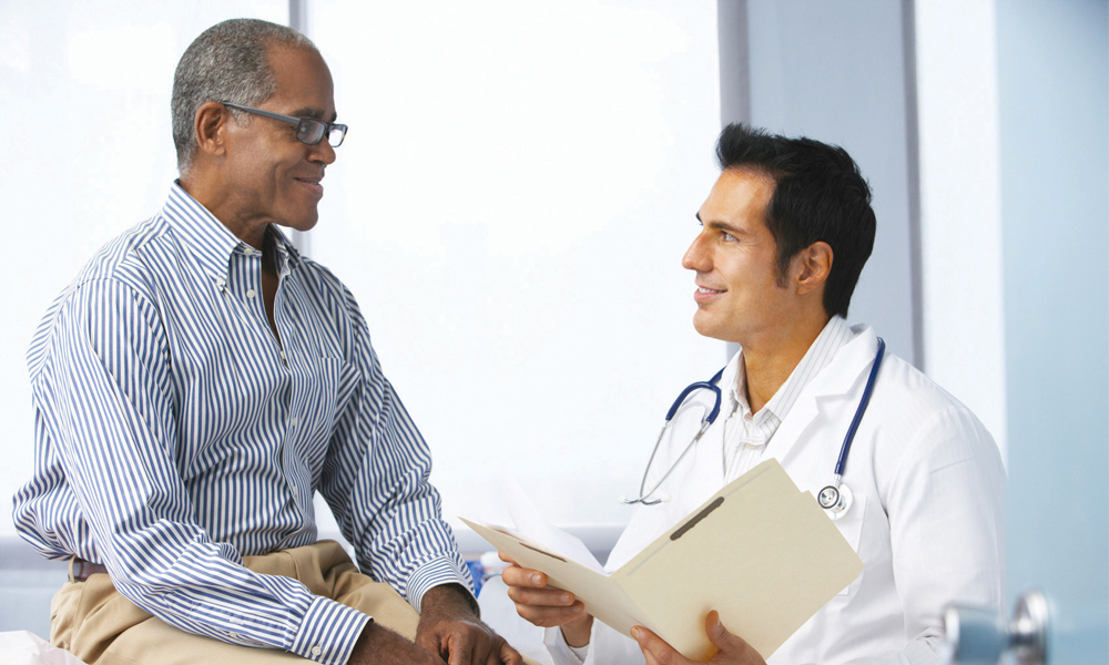 Doctor talking with patient