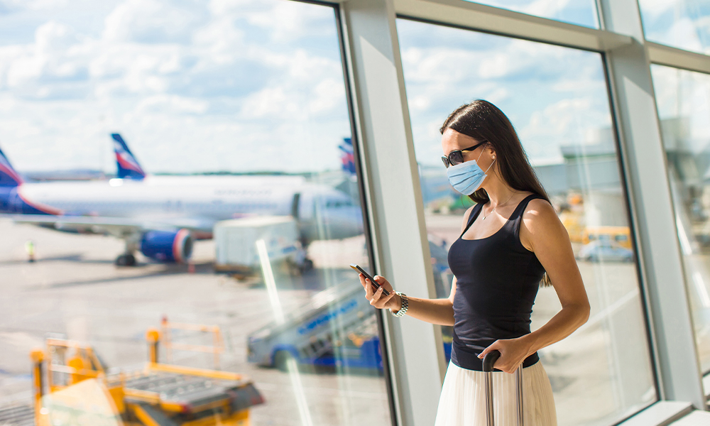 Woman wearing mask in airport